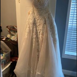 Wedding dress size 8. From David’s bridal. No alterations or anything to it.